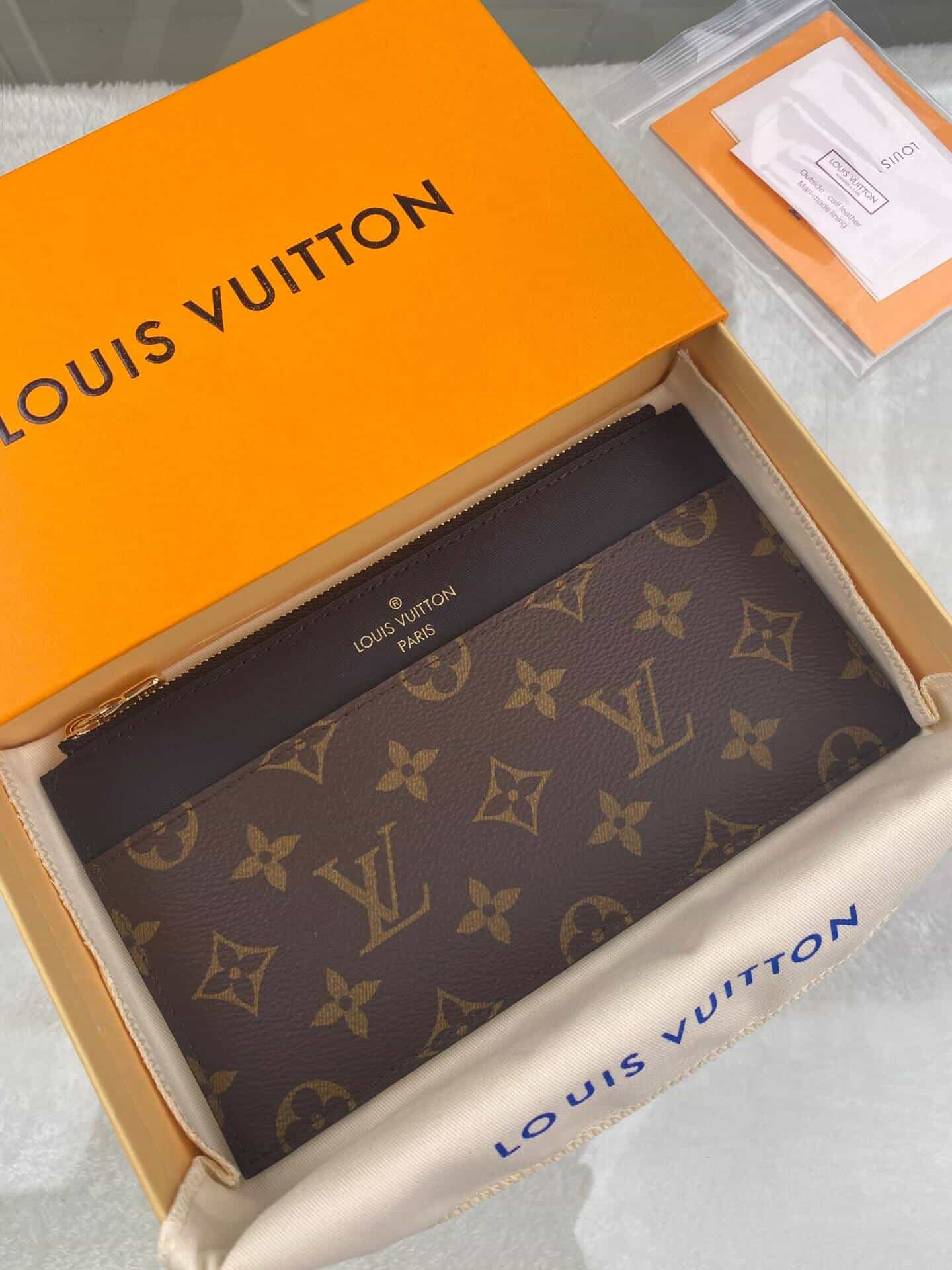 Shop Louis Vuitton MONOGRAM Slim purse (M80348) by puddingxxx